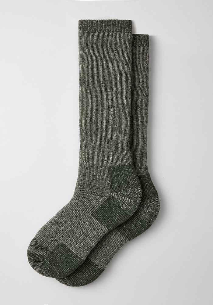 Woolx Mens Extreme Over The Calf Socks in Forest Dark Moss, with dark heels/toes, laid flat on white background.